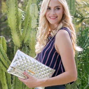Quilted fold over metallic clutch